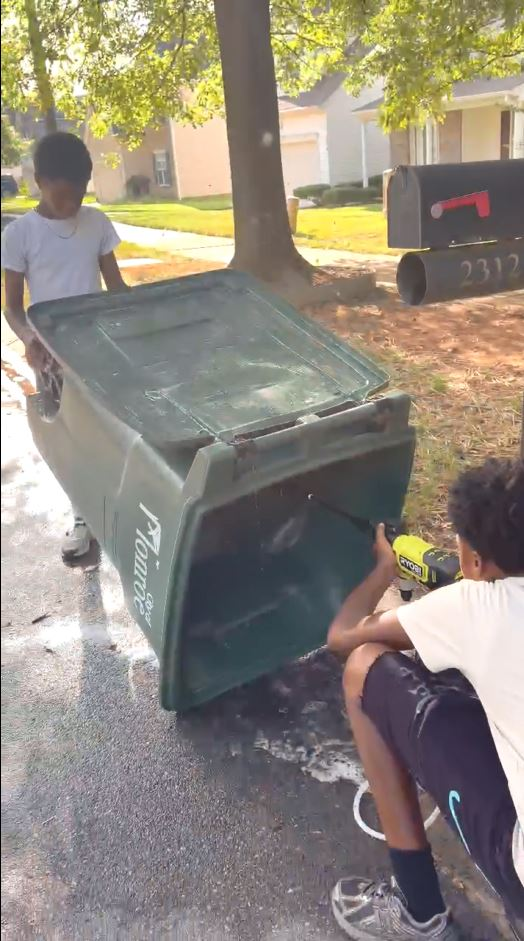 Garbage bin being cleaned by Bin Fresh